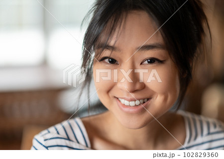 Close up of a cute asian young girl Close up of a cute asian young girl 102829360