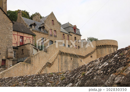 Houses and medieval wall in Le Mont-Saint-Michel Houses and medieval wall in Le Mont-Saint-Michel 102830350