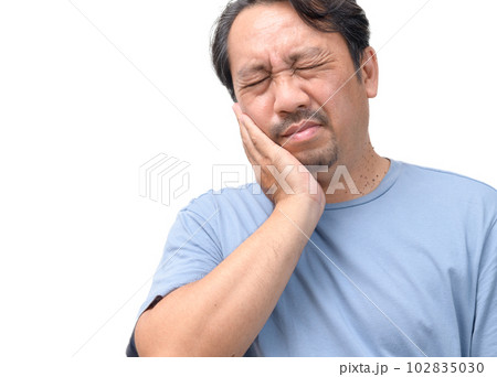 Handsome middle age senior man touching mouth with hand with painful expression because of toothache Handsome middle age senior man touching mouth with hand with painful expression because of toothache 102835030