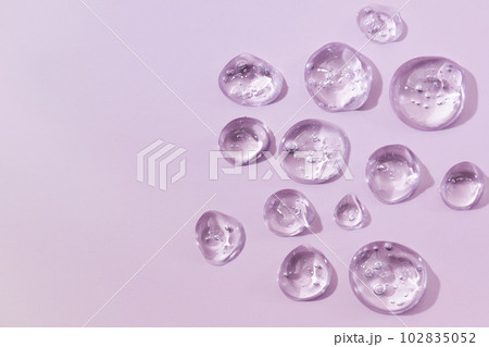 Drops of gel face serum top view. Abstract gel drops for design. Liquid gel moisturizer. 102835052