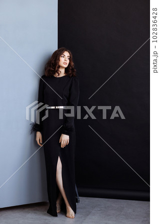 Attractive woman with long brunette hair Attractive woman with long brunette hair 102836428