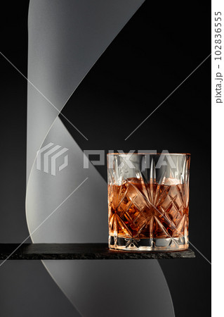 Whiskey with ice. 102836555