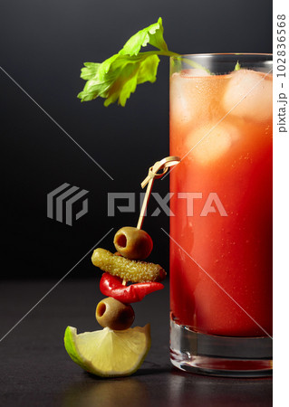 Cocktail Bloody Mary on a black background. Cocktail Bloody Mary on a black background. 102836568