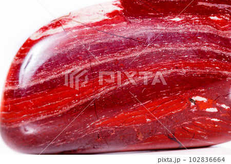 Macro mineral stone jasper "zebra iron" on a white background Macro mineral stone jasper "zebra iron" on a white background 102836664