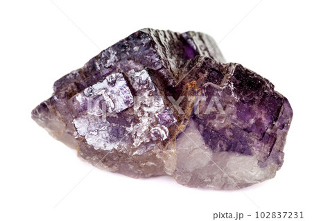macro mineral fluorite stone on white background macro mineral fluorite stone on white background 102837231