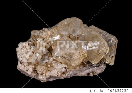 macro mineral fluorite stone on balck background macro mineral fluorite stone on balck background 102837233