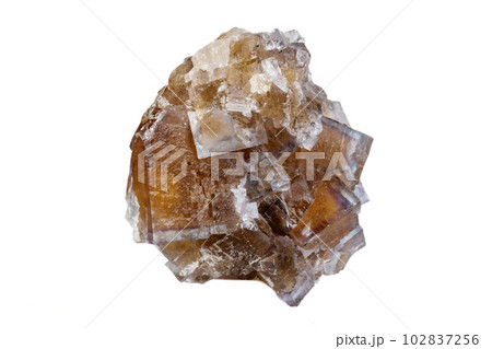 Macro mineral stone yellow Fluorite on a white background 102837256
