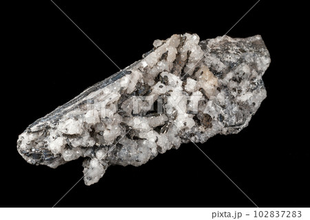 Macro mineral stone Stibnite quartz on a black background Macro mineral stone Stibnite quartz on a black background 102837283