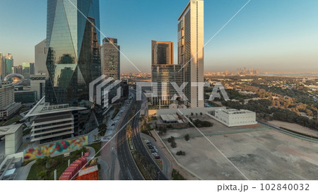 Panorama showing Dubai International Financial district aerial timelapse. View of business and financial office towers. 102840032
