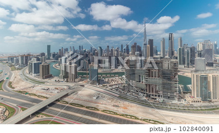 Panorama showing skyline of Dubai with business bay and downtown district timelapse. Panorama showing skyline of Dubai with business bay and downtown district timelapse. 102840091