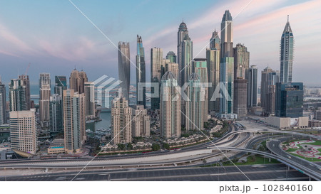 Dubai Marina highway intersection spaghetti junction night to day timelapse Dubai Marina highway intersection spaghetti junction night to day timelapse 102840160