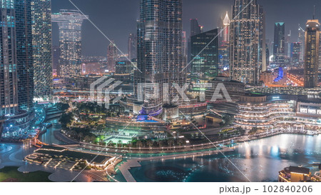 Aerial view of Dubai city day to night timelapse in downtown. Aerial view of Dubai city day to night timelapse in downtown. 102840206
