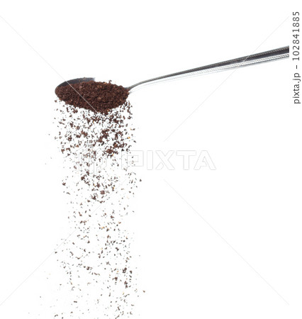 Coffee powder fall down pour in spoon, Coffee crushed float explode, abstract cloud fly. Coffee dust powder splash throwing in Air. White background Isolated high speed shutter, freeze motion 102841885