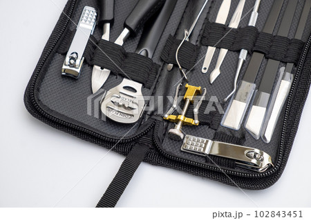 Close-up Professional Manicure Tools and Equipments Set on iSolated White Background Close-up Professional Manicure Tools and Equipments Set on iSolated White Background 102843451