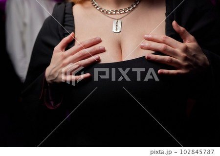 Decollete, female breast. Neckline dress and fur collar. Decollete, female breast. Neckline dress and fur collar. 102845787
