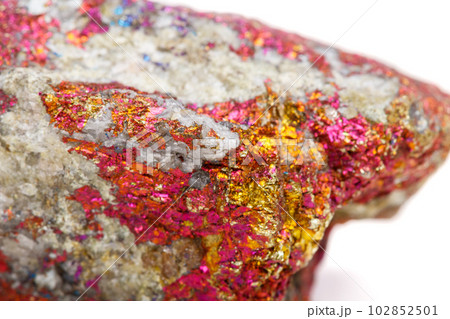 Macro mineral stone Chalcopyrite in the rock on a white background Macro mineral stone Chalcopyrite in the rock on a white background 102852501