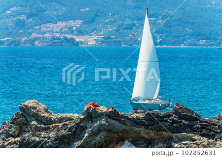 White Sailing Boat in the Mediterranean Sea - La Spezia Liguria Italy 102852631