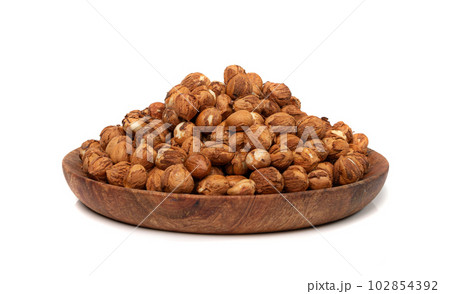 Nut Kernels, Hazelnuts Pile on Plate Isolated, Healthy Organic Nuts Group, Nut Kernels on White 102854392