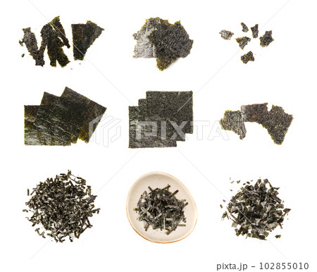 Nori Pieces Isolated, Dried Aonori Seaweed Flakes, Dry Sea Weed Torn Sheet, Seaweed Crumbles, Nori Pieces on White Nori Pieces Isolated, Dried Aonori Seaweed Flakes, Dry Sea Weed Torn Sheet, Seaweed Crumbles, Nori Pieces on White 102855010