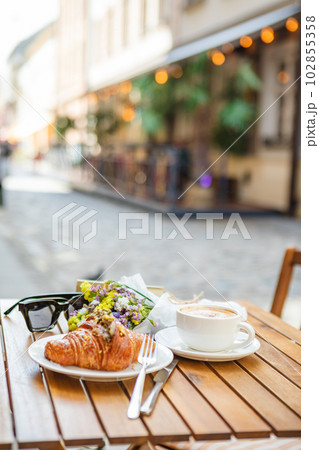 Served on the cafe's summer terrace with croissants and coffee Served on the cafe's summer terrace with croissants and coffee 102855358