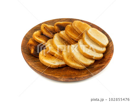 Dry Round Crackers Isolated, Sliced French Baguette Bread, Crunchy Croutons, Bruschetta Crackers, Round Rusks 102855476