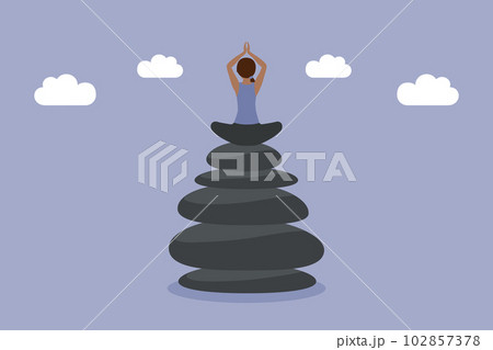 meditating woman sitting on a stack of zen stones work life balance concept meditating woman sitting on a stack of zen stones work life balance concept 102857378