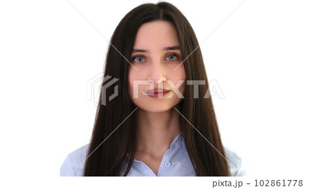 Young woman with dark long hair and blue eyes portrait on white background Young woman with dark long hair and blue eyes portrait on white background 102861778