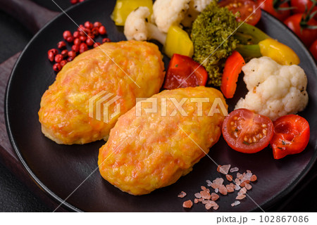 Delicious steam cutlets with carrots, cheese, salt and spices 102867086