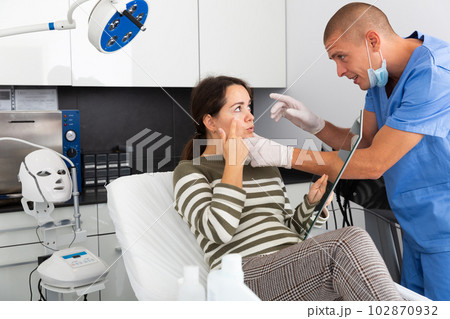 Woman having consultation with doctor in clinic Woman having consultation with doctor in clinic 102870932