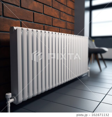 White radiator with temperature control valve. Central heating battery. 102871132