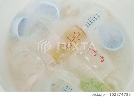 bottle of milk are washing in basin bottle of milk are washing in basin 102874789