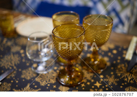 Wine glasses in warm light loft restaurant. Wine glasses in warm light loft restaurant. 102876707