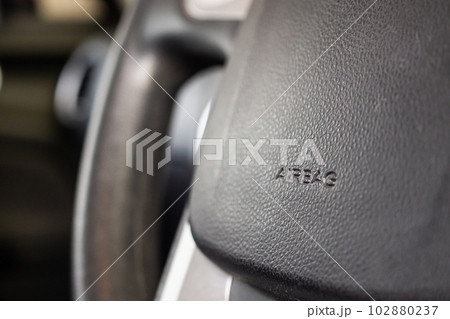 Safety airbag sign on car steering wheel Safety airbag sign on car steering wheel 102880237