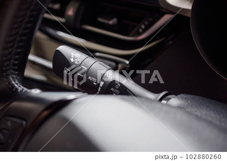car windshield rain wiper control switch close up 102880260