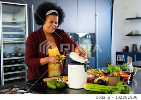 Happy plus size african american woman wearing - Stock Photo [102882802]  - PIXTA