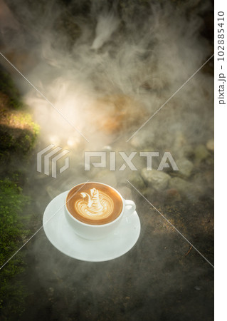 Background Coffee cup and beans on old kitchen table. Background Coffee cup and beans on old kitchen table. 102885410