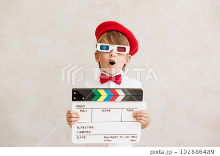 Child pretend to be a director Child pretend to be a director 102886489