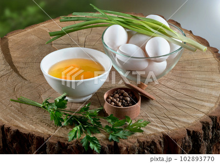 Egg, foods on a wooden background Egg, foods on a wooden background 102893770