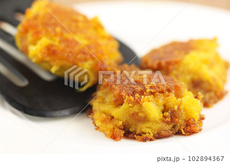 Mushroom chops with a spoon Mushroom chops with a spoon 102894367