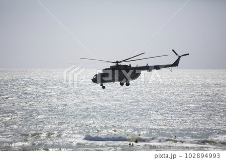 Ukraine. Odessa region, August 30, 2019. Central beach. Helicopter flies over the sea 102894993