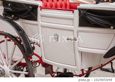 Details and elements of the construction and decor of an old carriage 102905049