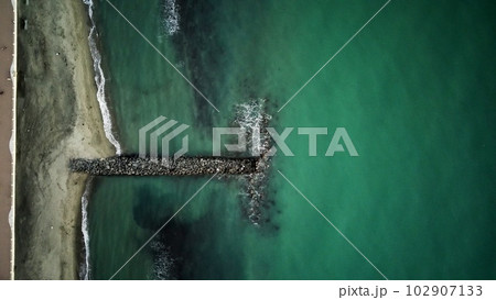 stones and sea of turquoise color. drone shot. 102907133
