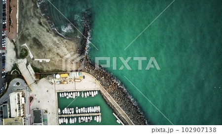stones and sea of turquoise color. drone shot. 102907138