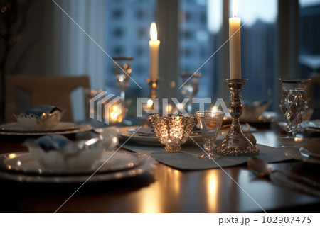 Romantic table setting with candles and flowers Romantic table setting with candles and flowers 102907475