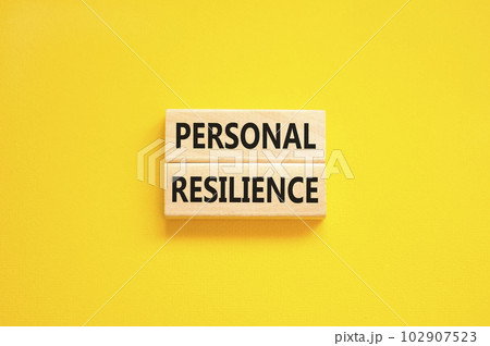 Personal resilience symbol. Concept word Personal resilience typed on wooden blocks. Beautiful yellow table yellow background. Business psychological and personal resilience concept. Copy space. Personal resilience symbol. Concept word Personal resilience typed on wooden blocks. Beautiful yellow table yellow background. Business psychological and personal resilience concept. Copy space. 102907523