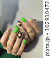 fashion manicure of nails on a beautiful background 102910472
