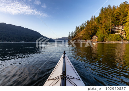 Kayaking in Indian Arm near Belcarra, Vancouver, BC, Canada. Kayaking in Indian Arm near Belcarra, Vancouver, BC, Canada. 102920887