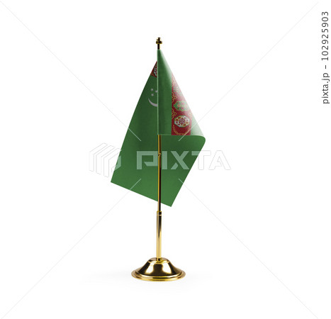 Small national flag of the Turkmenistan on a white background 102925903