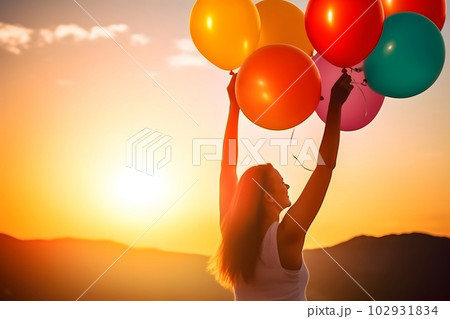 inspirational dream and creativity - happy life woman with colored air ballons rising hands in the air, neural network generated image 102931834