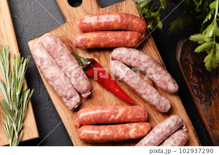 Various raw meat sausages and spices Various raw meat sausages and spices 102937290